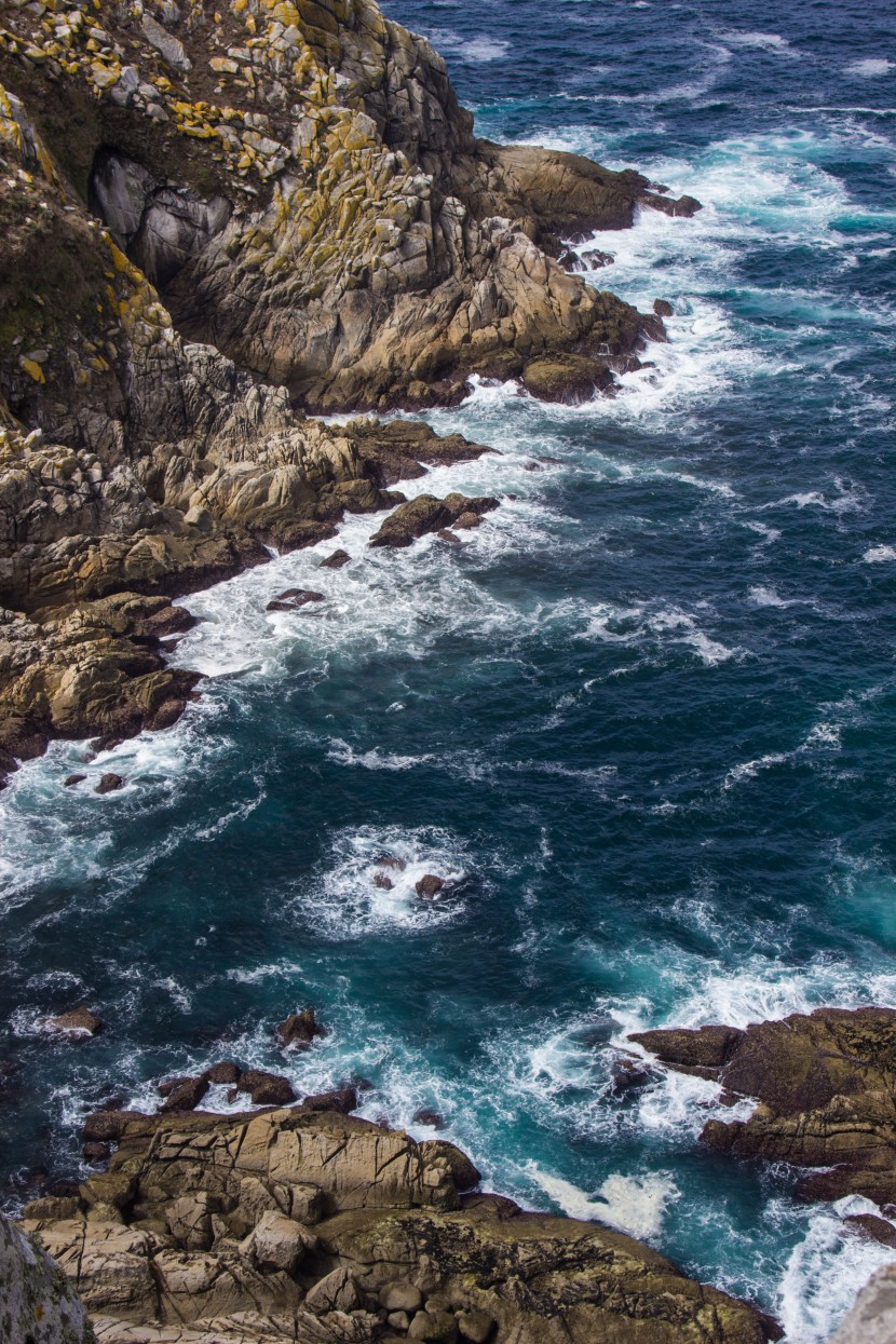 海邊的礁石風景圖片